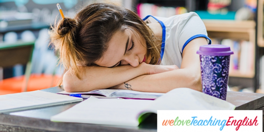 Girl sleeping on table